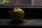 Quince on the autumn window