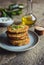 Quinoa fritters with zucchini, garlic and green onion served with yoghurt dip