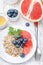 Quinoa porridge with grapefruit, fresh berries blueberry