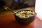 Quinoa salad in a brown handmade terracotta bowl