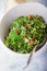 Quinoa tabbouleh salad on a wooden table