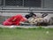 Quito, Ecuador, 1-2-2020: A homeless person in Quito, South America sleeping on collected matrasses with two dogs next to him