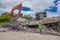 Quito, Ecuador - April, 17, 2016: House destroyed by Earthquake with rescuers and heavy machinery in the south part of