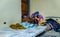 QUITO, ECUADOR, AUGUST 21, 2018: Pile of colorful clothes, bags and accessories in the ground of a room inside of a