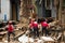 Quito, Ecuador - December 09, 2016: An unidentified group of firemans, cleaning the damage area and destruction, debris