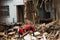 Quito, Ecuador - December 09, 2016: An unidentified group of firemans, cleaning the damage building