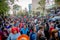 Quito, Ecuador - January 26, 2015: Large crowd celebrating new years during daytime gathering in city streets