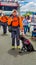 Quito, Ecuador - January 31, 2018: Outdoor view of unidentified man with a beautiful black labrador dog, group of rescue