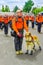 Quito, Ecuador - January 31, 2018: Outdoor view of unidentified man with a beautiful golden retriever dog, group of