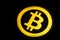 Quito, Ecuador - January 31, 2018: Top view of Golden Bitcoin single logo. Bitcoin cryptocurrency, business concept