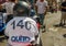 QUITO, ECUADOR - JANUARY 31, 2018: Unidentified boys racing a wooden car in the streets of city of Quito, back view