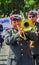 Quito, Ecuador - January 31, 2018: Unidentified goup of man wearing beret and playing trumpets during a festival parade