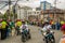 QUITO, ECUADOR - JULY 7, 2015: People waitting on the streets of the city, pope Francisco in his popemobile. Police