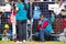 QUITO, ECUADOR - JULY 7, 2015: Volunteers behind the metal mesh guarding people at pope Francisco mass, blue vest