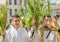 QUITO, ECUADOR- MARCH 23, 2018: Outdoor view of unidentified people and priest holding in hands a megaphone and