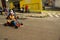 Quito, Ecuador - May 06, 2017: An unidentified couple racing on a wooden car in urban road inside of the streets of city