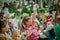 QUITO, ECUADOR- NOVEMBER, 28, 2017: Close up of children enjoying the foam party at Quito festival in a sunny day