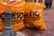 QUITO, ECUADOR NOVEMBER, 28, 2017: Close up of two garbage bags acomodated close to a metallic structure at historical