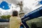 QUITO, ECUADOR - SEPTEMBER 10, 2017: Unidentifed woman taking pictures of panecillo statue and enjoying the beautiful