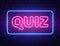 Quiz neon text banner on brick wall. Questions team game. Quiz night poster. Pub neon signboard. Night bright