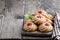 Qurabiya cookie shortbread with jam on rustic wooden table