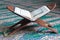 Quran on a wooden stand in mosque.