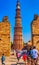 Qutb Minar tower seen through the ruined Quwwat ul-Islam Mosque at Qutub Minar complex - New Delhi, India