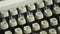 Qwerty key, letters, numbers, and symbols on typewriters