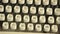 Qwerty key, letters, numbers, and symbols on typewriters