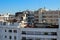 Rabat houses with narrow Windows, balconies, drying clothes and lots of satellite dishes