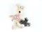 Rabbit doll that was stripped of clothes on white background. statutory rape concept