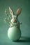 Rabbit with a large Easter egg on a soft green background. The image is generated with the use of an AI.