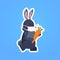 Rabbit in mask holding carrot happy easter spring holiday coronavirus pandemic quarantine