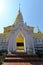 Rabbit sculptures lining archway to the central golden stupa at Wat Phra That Chae Haeng, an old Buddhist temple in Nan, Thailand