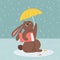 Rabbit walking under umbrella with book. Autumn rainy postcard. Bunny or hare - childish mascot 2023 symbol year