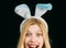 Rabbit woman wearing ears. Spring holiday. woman wearing a mask Easter bunny and looks very sensually. woman