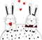 Rabbits in love. A hare boy with a heart in his hand with a rabbit girl