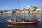 Rabelo boat and Porto in background