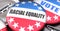 Racial equality and elections in the USA, pictured as pin-back buttons with American flag, to symbolize that Racial equality can