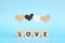 Racial equality, inclusion, love and cultural diversity concept. Brown, black and white color heart shape icon in blue