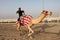 Racing camel trainer