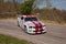 Racing car Ford Mustang drifting with smoking tires