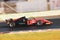Racing car single seater modern formula in action close up blurred motion