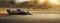 Racing car speeding on a track at sunset. A high-speed Formula one, dynamic motion effects capturing the intensity of a