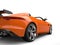 Racing orange modern luxury sports car - rear wheel closeup shot