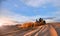 Racing powerful quad bike on the difficult sand in the summer