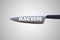 Racism letters on a knife blade demonstrating racism danger and discrimination risk concept. 3D illustration.