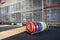 Rack of colorful training weights in a gym