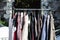 Rack of old fashioned women\'s clothes at garage sale