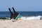 Rackets and ball on the sandy beach. Summer sport concept